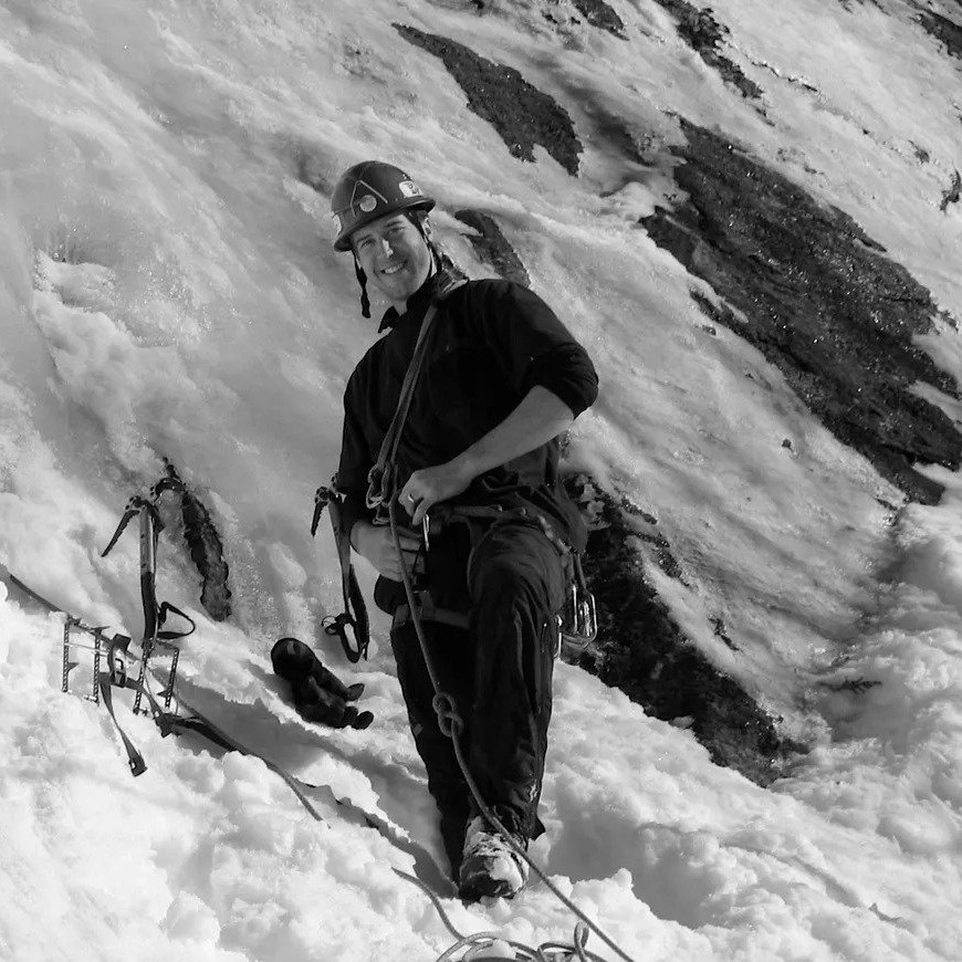 Ben hiking in to the snowy mountaint