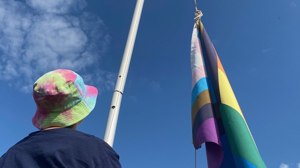 Students and staff gather for PRIDE flag-raising