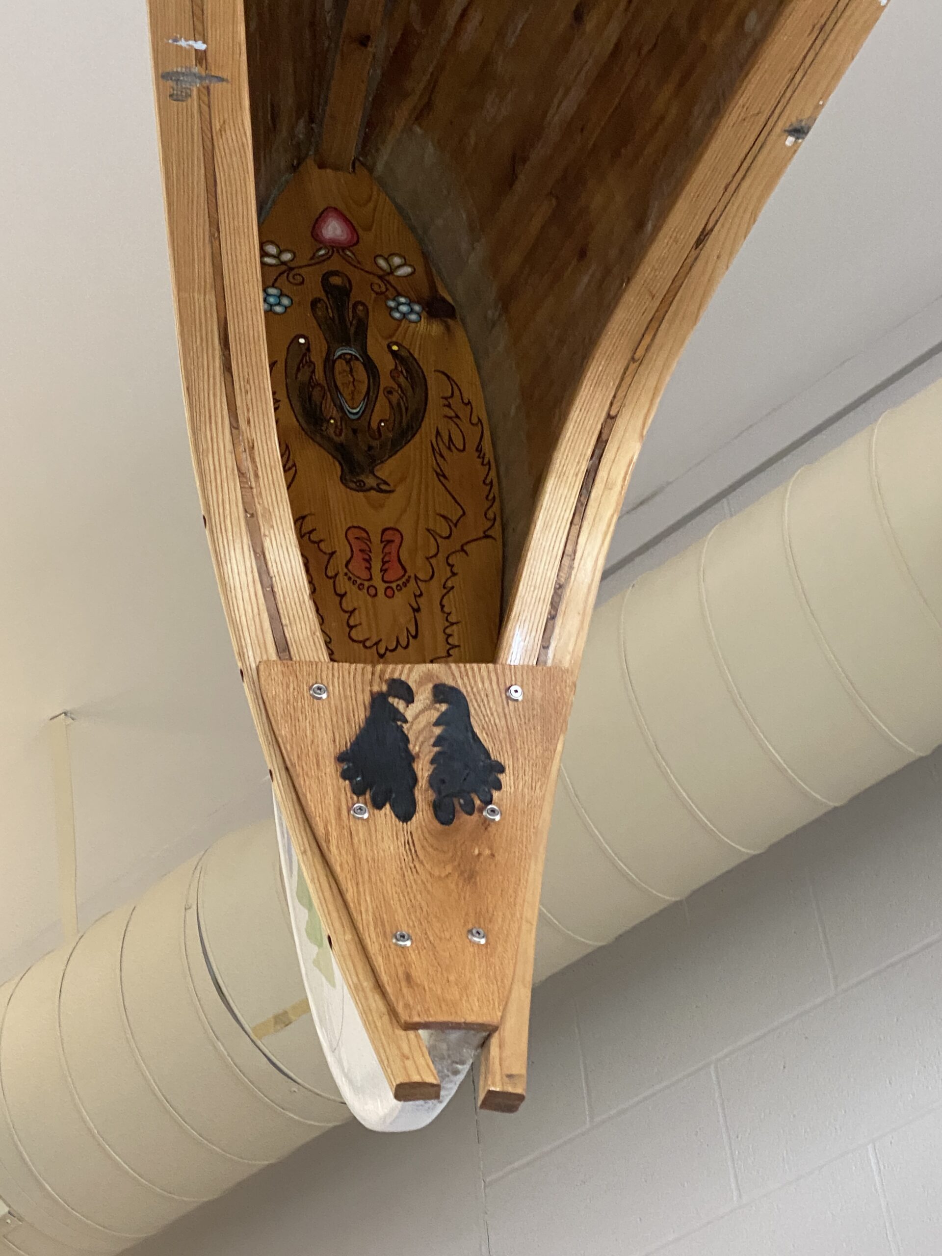 Close up of artwork inside a canoe.